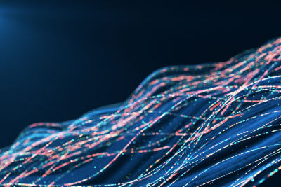 Abstract image of internet connection and a flowing data on a dark background.